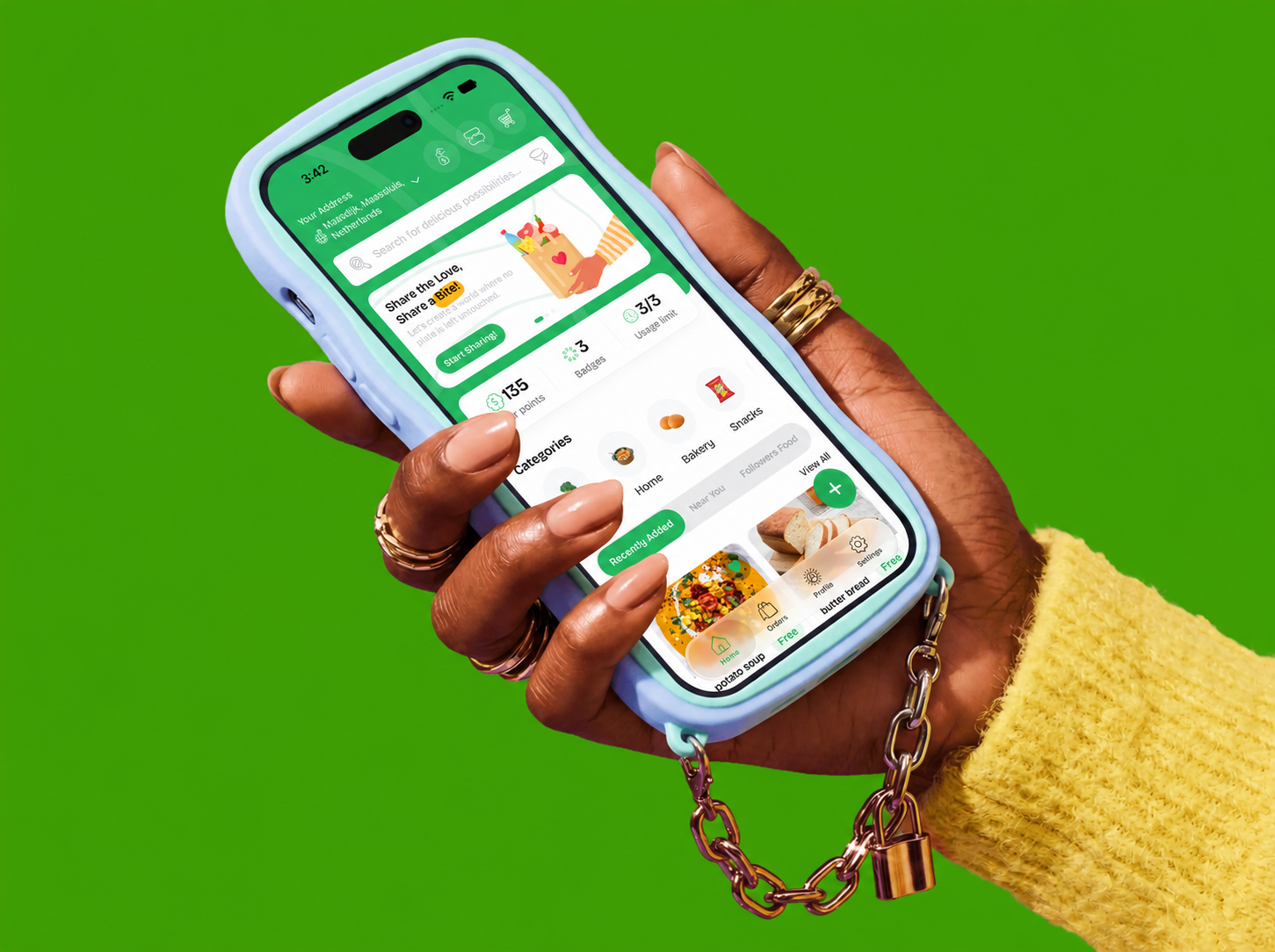 Foosh food-sharing app on an iPhone held against a green background